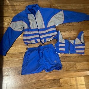 Adidas track set. Worn once. XS but fits like a small.mI’m 5’0 135 pounds.